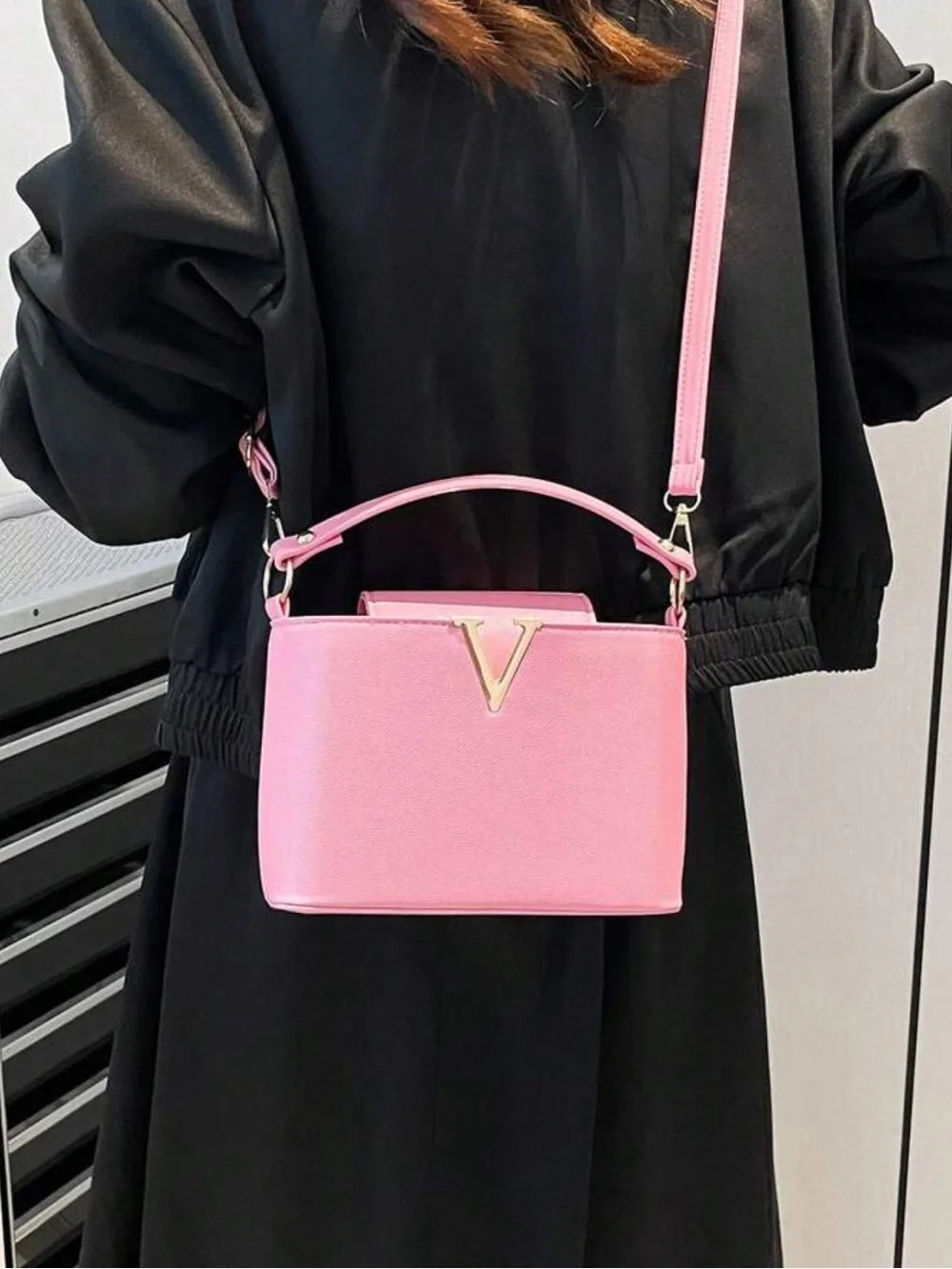 Elegant Pink Mini Top-Handle Crossbody Bag with Gold V Accent